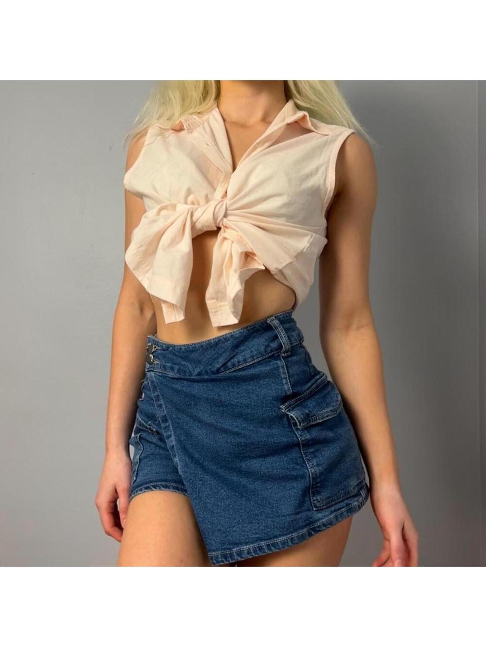 baby pink oversized sleeveless button down shirt